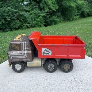 Vintage ERTL Transtar Steel Automatic Hydraulic Toy Dump Truck Brown/Orange